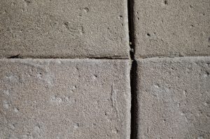 Outdoor concrete paneling, organized between but disorganized within.