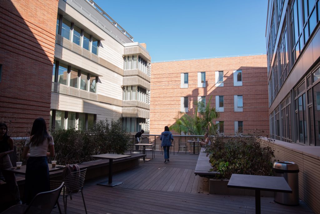 After an afternoon of studying and chatting, students slowly disperse as the computer science department prepares for its weekly Tea Time with its graduate students. The third floor patio of the Engineering VI building is nestled in the botanical quad formed by Engineering VI and Engineering V, a perfect place to catch up with friends. Photographed by Julia Gu/BruinLife.