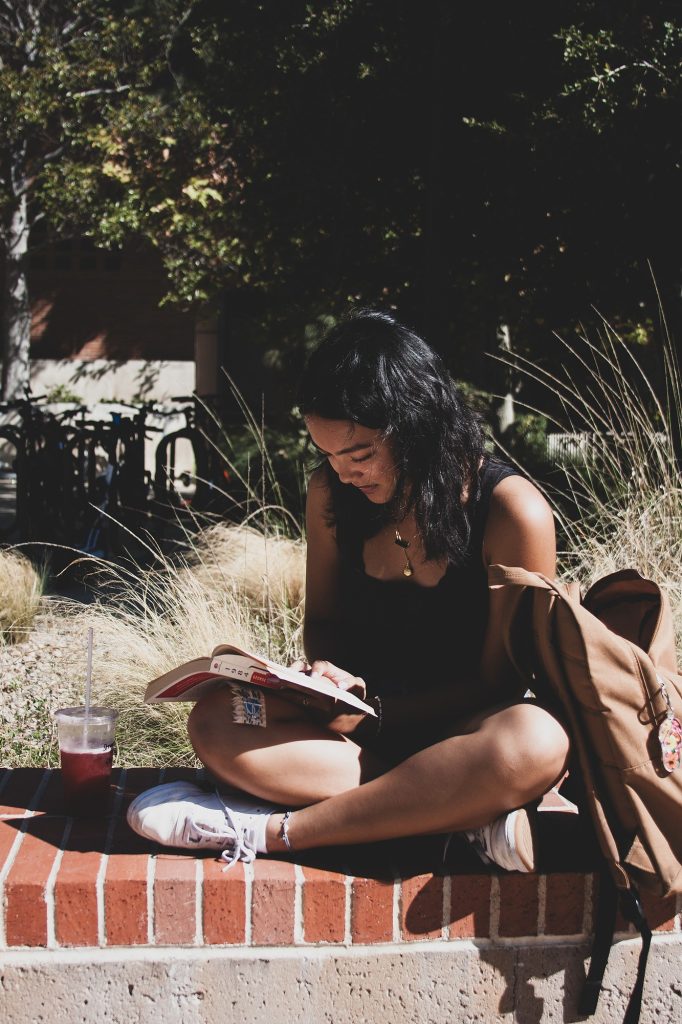 Isabella Morelos, a second-year student majoring in neuroscience, is reading "1984" by George Orwell in the Court of Sciences. "It is nice to sit and read between classes in the sun, passing time," Morelos said.