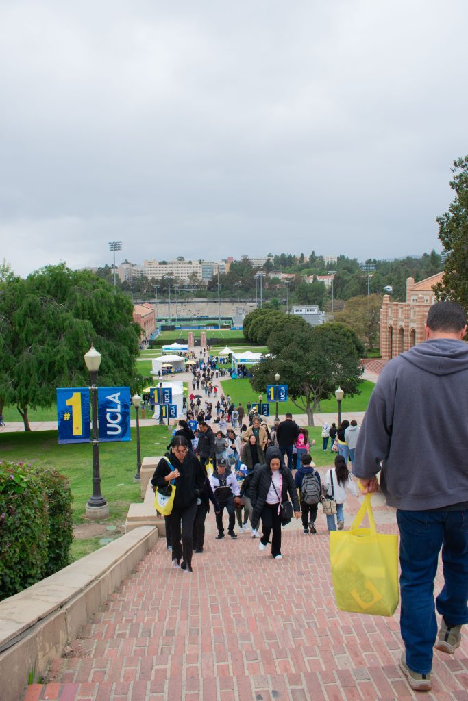 Visitors walk up Janss/Kuruvungna Steps to seek out further Bruin Day festivities.