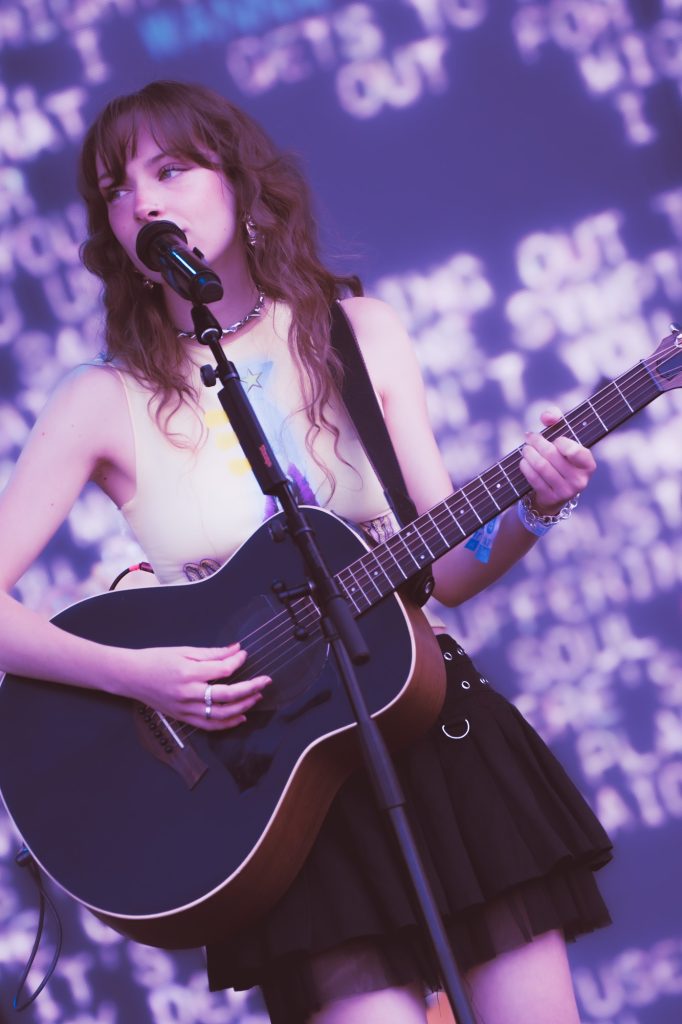 Humberstone serenaded the crowd with her acoustic guitar as she transitioned into some her more soft and melodic tracks. Photographed by Cathryn Kuczynski/BruinLife.