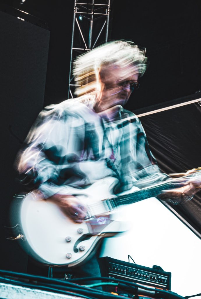 Wayne Hussey of The Mission U.K. takes the stage and instantly draws in a growing crowd as his band begins their midday set at Cruel World. Photographed by Cathryn Kuczynski/BruinLife