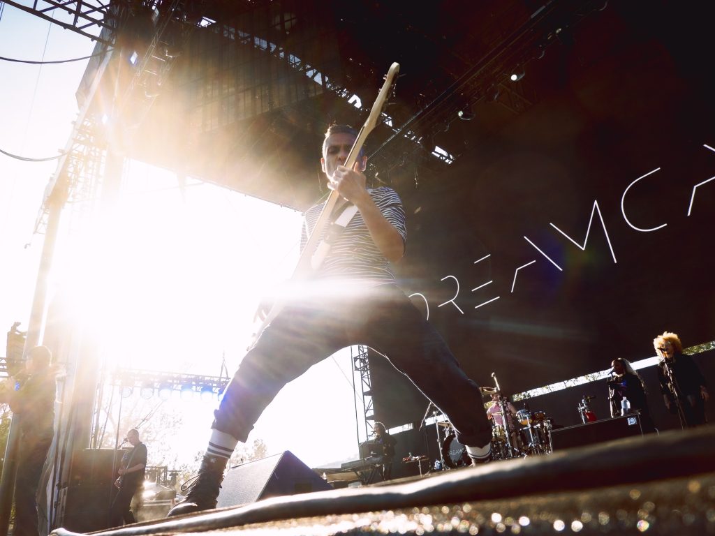 Tony Kanal of DREAMCAR takes a power lunge as he plays a riff to the Outsiders stage at Cruel World Festival. Kanal started his music career as a bassist for No Doubt when he was 16. Photographed by Finn Martin/BruinLife