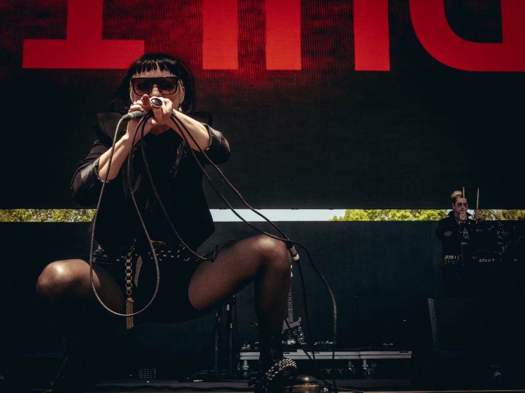 ADULT. shines on the Outsiders stage on Saturday afternoon. Photographed by Finn Martin/BruinLife