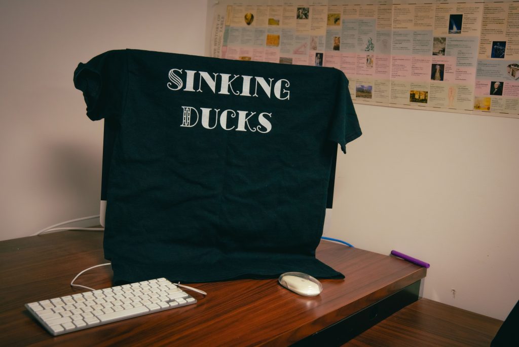 One fixture of the band is its custom tees, designed by Katie Choo, a first year Geography and Environmental Studies major minoring in Asian Languages. Photographed by BruinLife/Finn Martin
