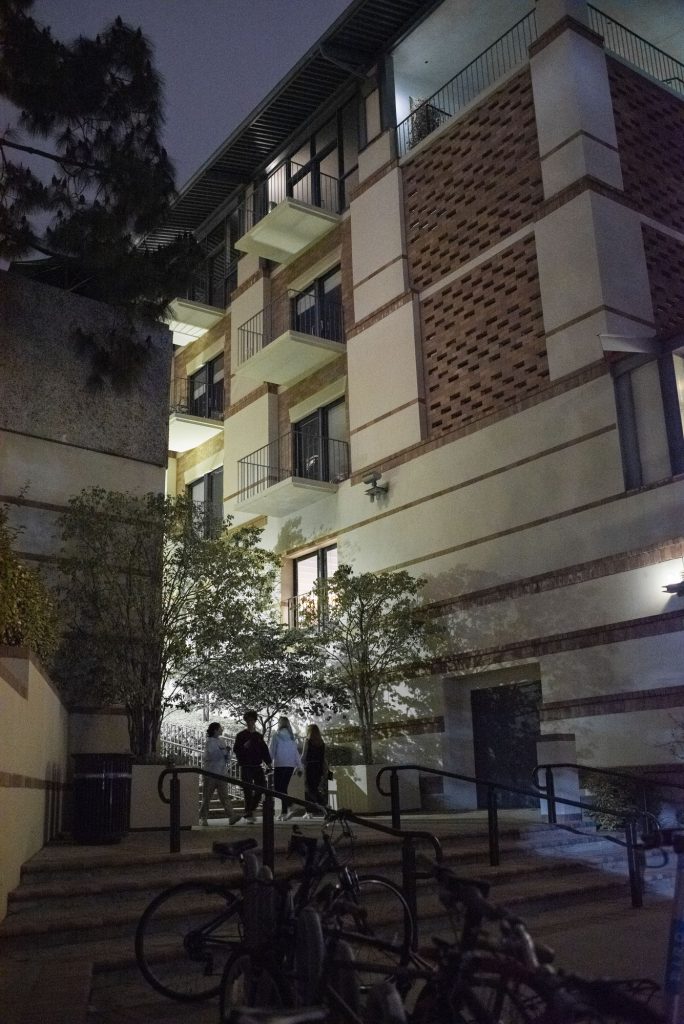 Students walk up the stairs leading up to Covel Commons. Affectionately (or perhaps appropriately) termed the Awkward Steps, it is the place where Bruin Dine volunteers meet to prepare for the night ahead. Photographed by Julia Gu/BruinLife