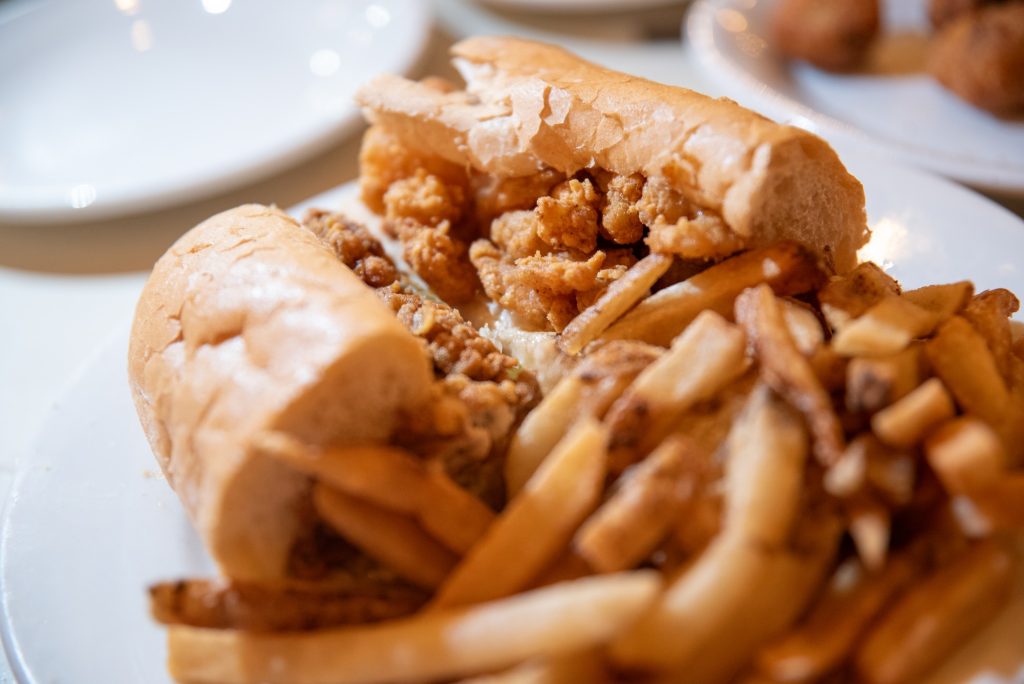 Though any Po-Boy can delight, a visitor to Felix's Restaurant and Oyster Bar ought not to go head first for one of these sandwiches and would be better advised ordering the freshly made oysters. Photographed by Finn Martin/BruinLife.