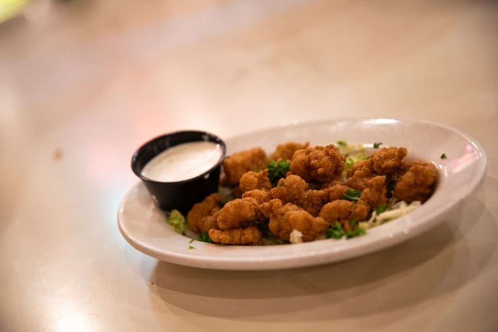 The fried gator is served with a ranch dip. This unique appetizer is a light but fulfilling way to begin your meal. Photographed by Finn Martin/BruinLife.