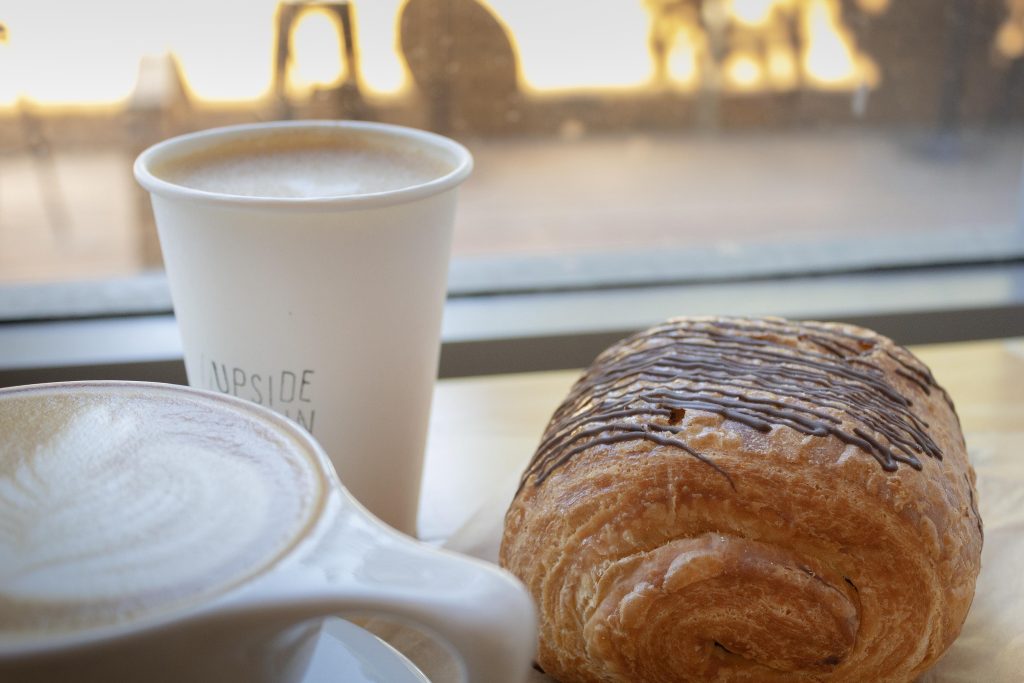 Upside Down's volunteer run cafe provides sweets and coffee in a cozy study space. Photographed by Sapna Drew/BruinLife.