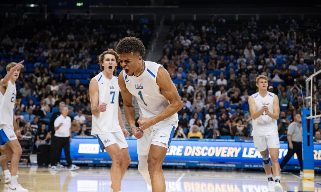 UCLA #1 Cameron Thorne erupts in celebration after clinching the 4th set, tying the game. Photographed by Ryan Zhang/BruinLife