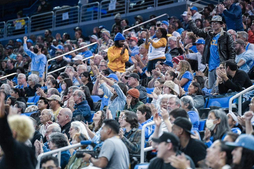 UCLA fans cheer loudly during the final three minutes of the fourth quarter as the Bruins lead 63-45. Photographed by Ryan Zhang/BruinLife.