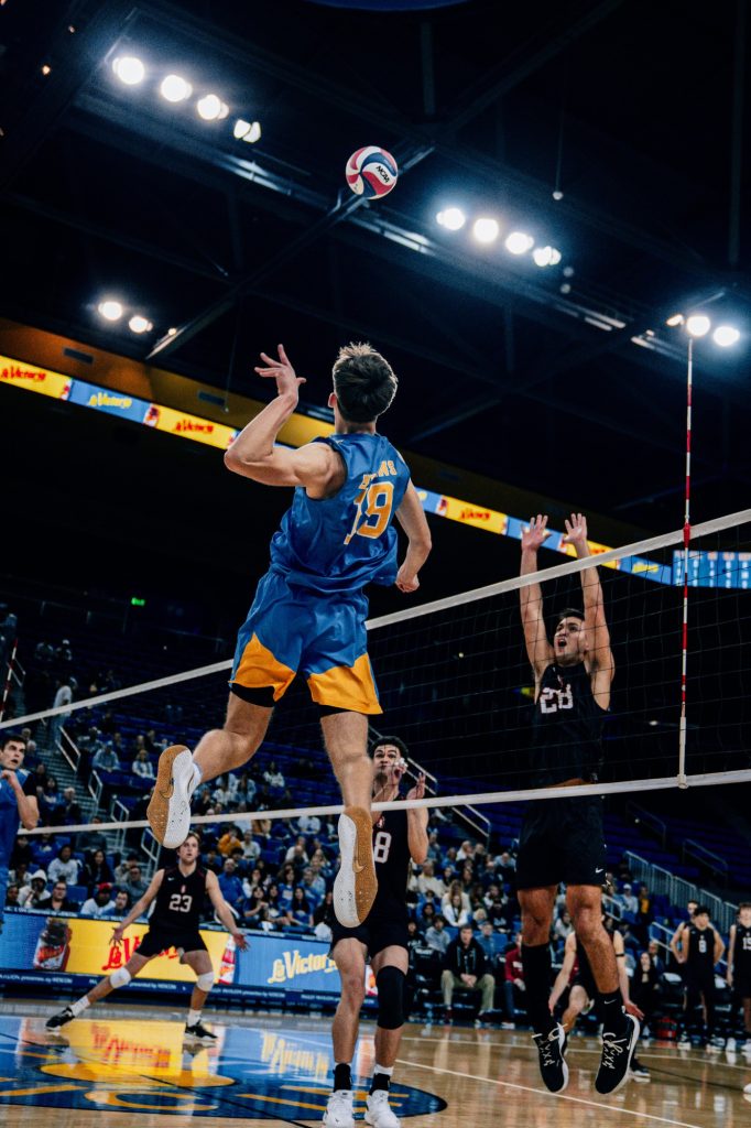 Sophomore David Decker makes an opposite attack for the Bruins. Photographed by Cathryn Kuczynski/BruinLife.