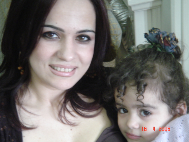 Baby Celia Kebbeh sits on her mother, Lizette Dekrmanjian's lap. This picture was taken in 2006, located at their house in Syria.