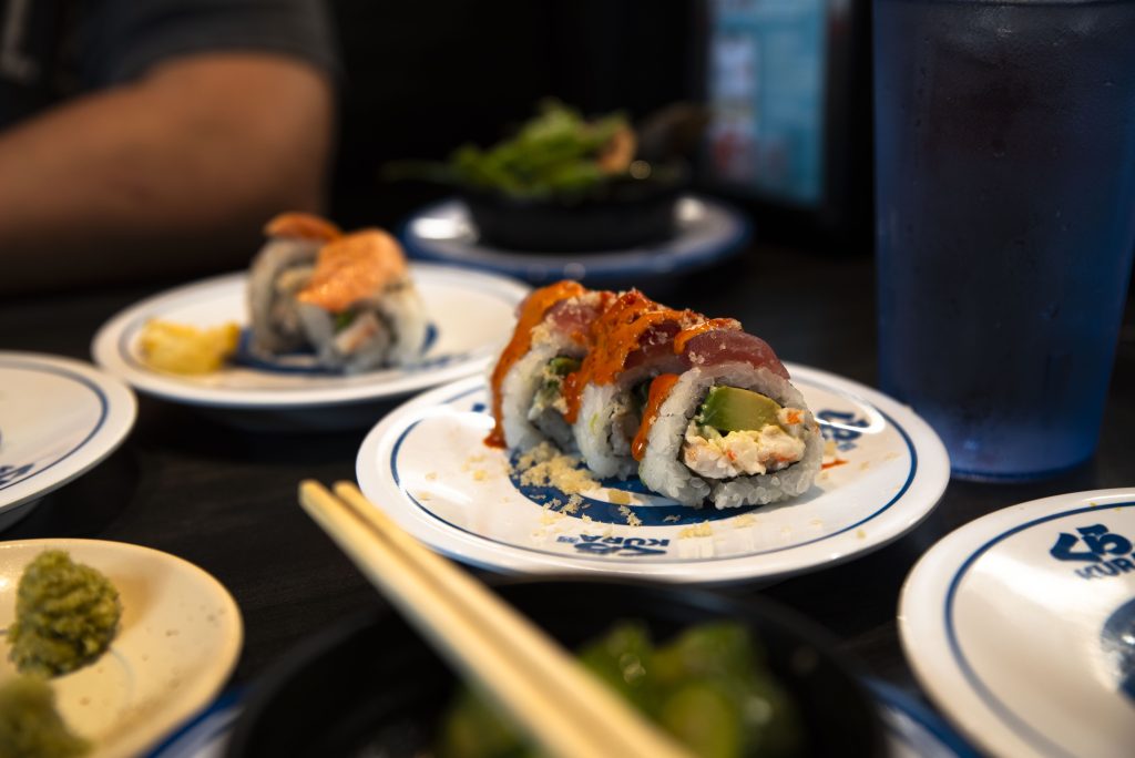The red dragon role has avocado and shrimp wrapped in rice and topped with tuna. The spicy mayo and tempura crumble add the perfect finishing touch. Photographed by Emily Chandler/BruinLife.