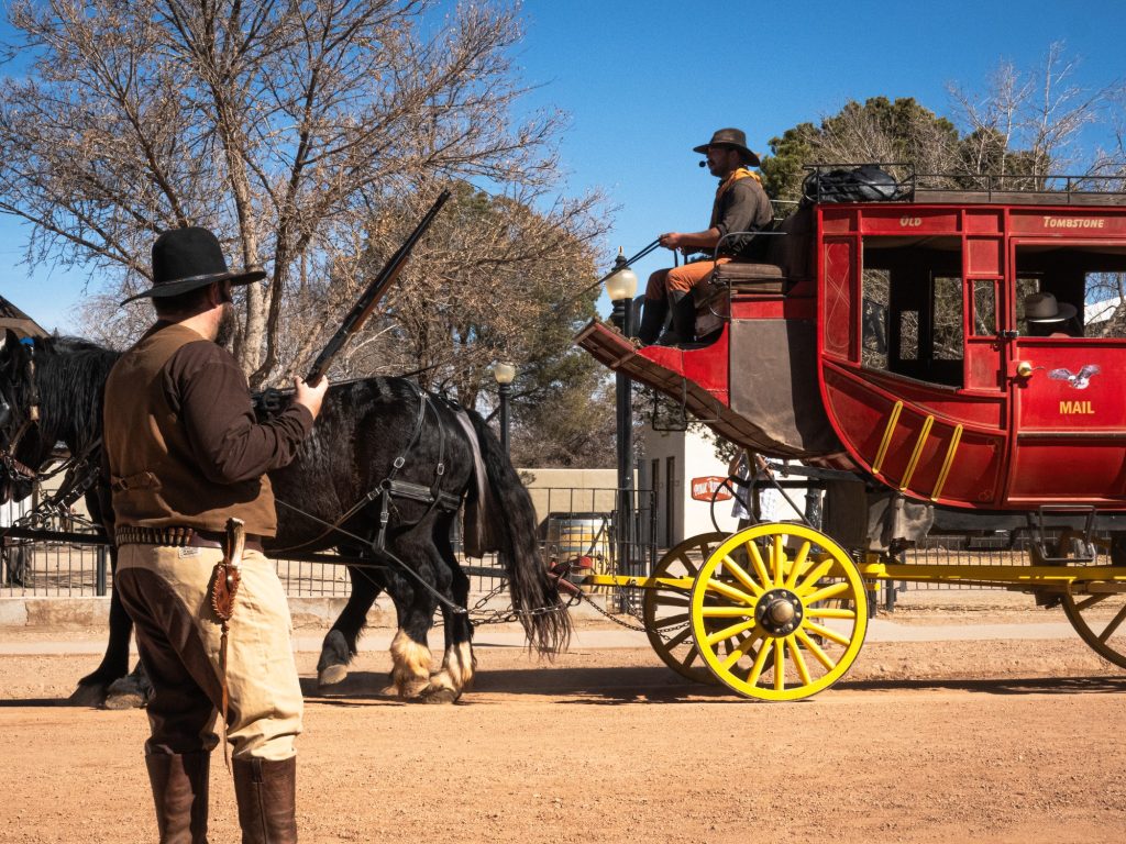 These gunfighters won't fire on you, but they'll certainly act the outlaw. Reenactors can be found walking all over the town of Tombstone. Photographed by Finn Martin/BruinLife.