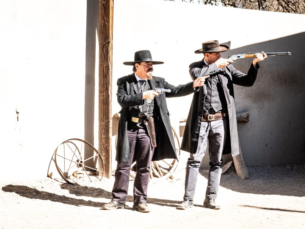 Reenactors play out the town's historical gunfight in the original O.K. Corral lot. Live blanks are fired to give the reenactments a more authentic feel. Photographed by Finn Martin/BruinLife.