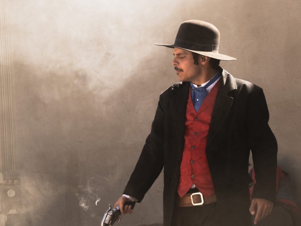 Here stands an actor portraying Doc Holliday at the gunfight's end. Reenactments can be caught frequently throughout the day. Photographed by Finn Martin/BruinLife.