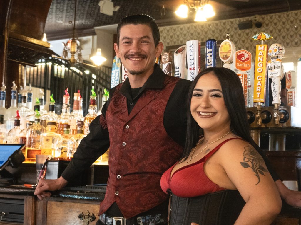 Donnie Estrado and Lexi Chavez of the Crystal Palace Saloon serve up lunch and dinners in this period piece establishment. Enjoy a chicken fried dinner and a Doc Holliday soda here while watching the 1993 movie Tombstone. Photographed by Finn Martin/BruinLife.