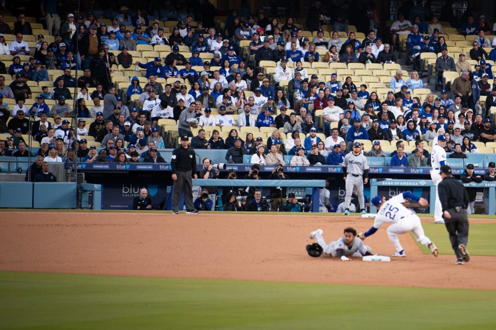 A tough slide at second. Photographed by Finn Martin/BruinLife.
