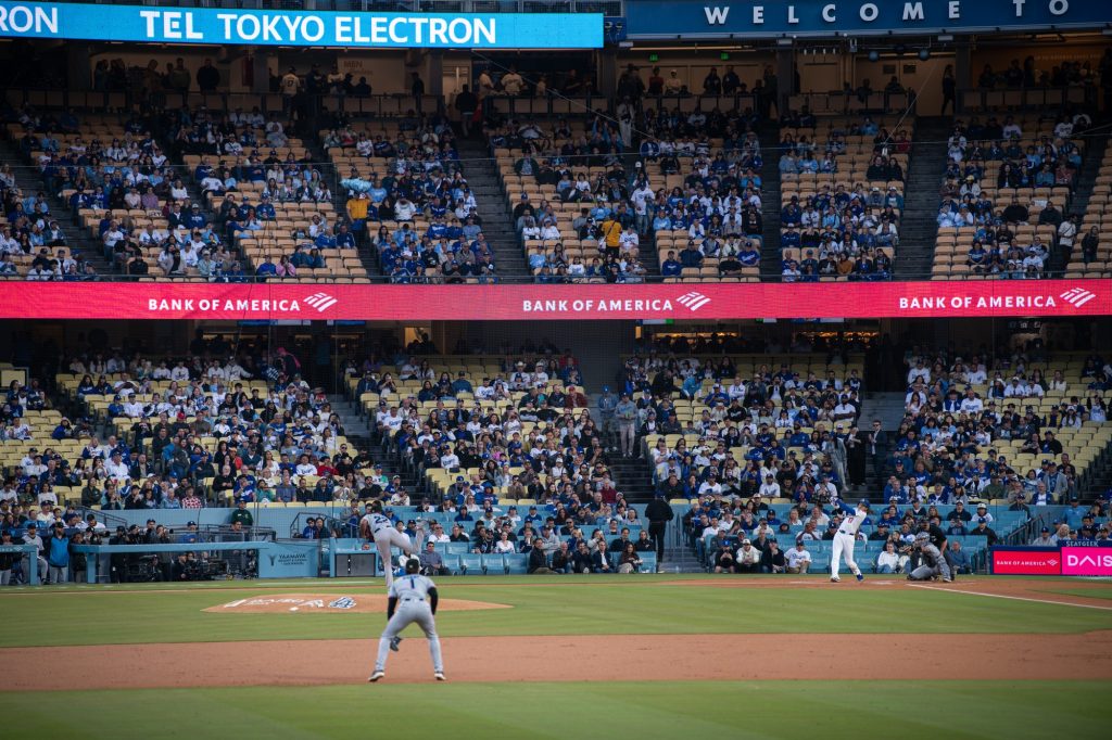 Dodgers' Shohei Ohtani rockets the first pitch from the Marlins into the orbits for a home run. Photographed by Finn Martin/BruinLife.