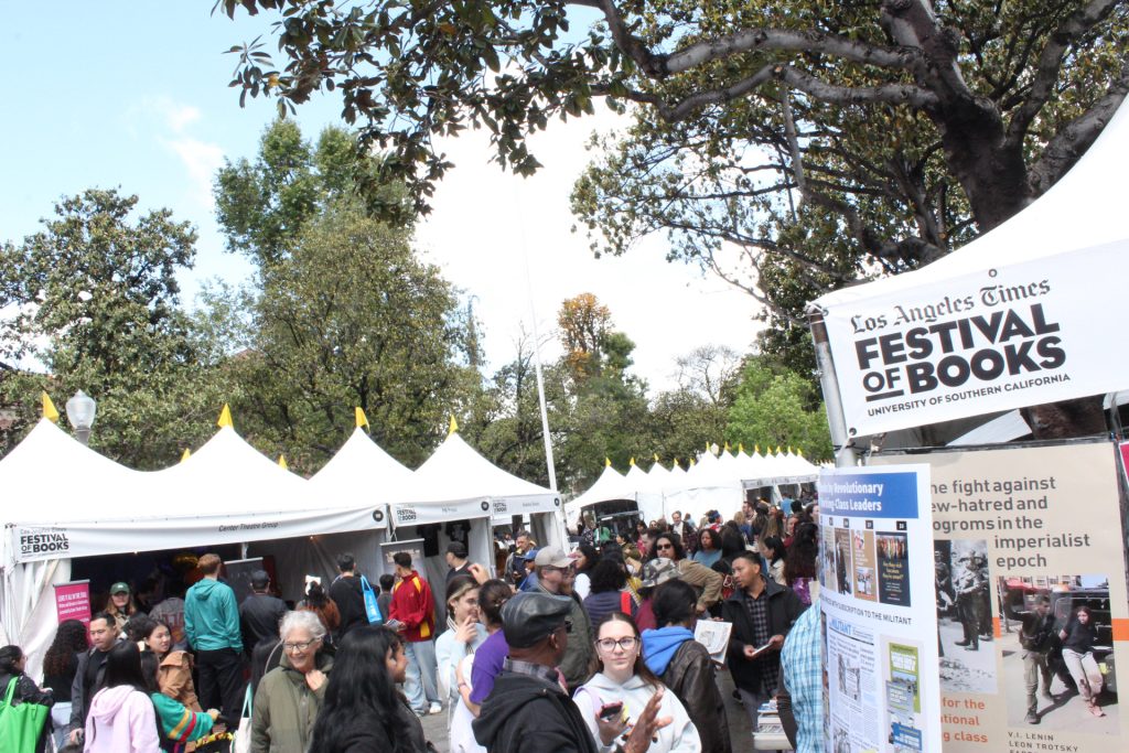 Bookworms explore the many unique stores featured at the 2025 LA Times Festival of Books. Photo by Gavin Meichelbock.