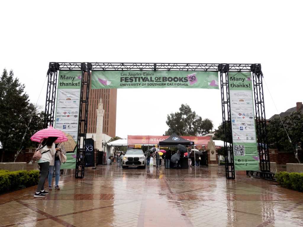 The Festival of Books opens up Saturday morning to the first rain it's ever experienced since its first year 30 years ago. Photographed by Finn Martin/BruinLife.
