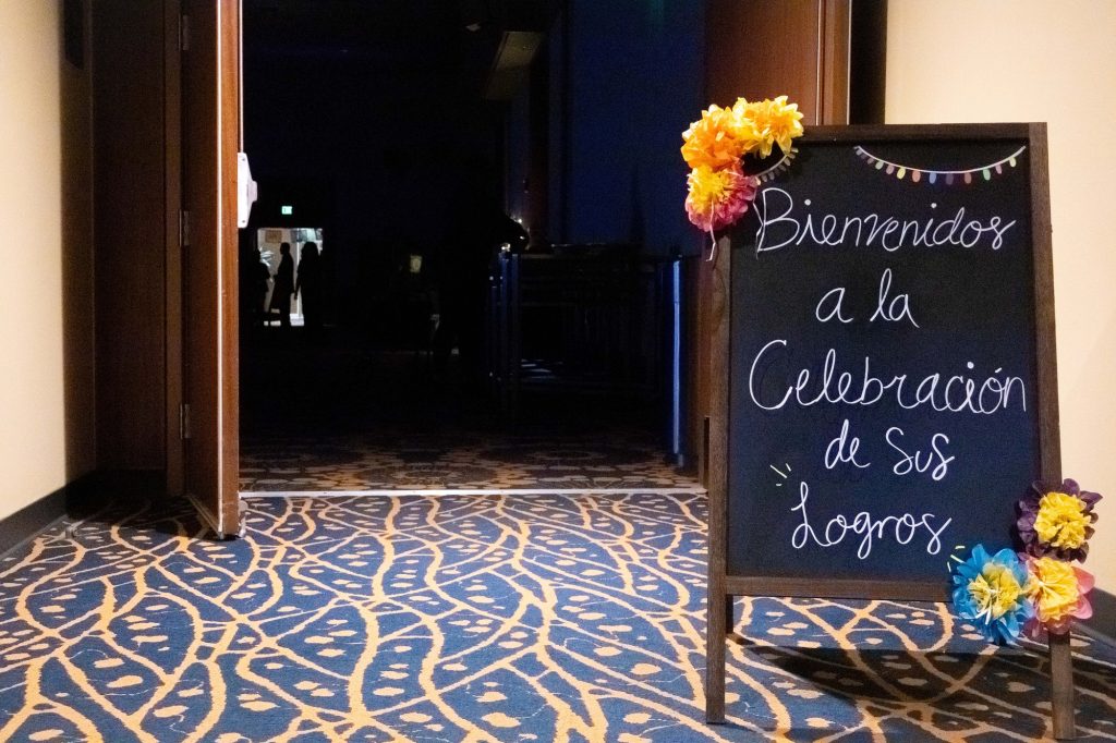A vibrant sign welcomes students to the Pachanga event, a celebration for Latinx student admits topped with a DJ and classics in Latin music. As a festivity of accomplishments and a vibrant night of bonding, the event brings a sweet end to UCLA Latinx Admit Weekend. Photographed by Julia Gu/BruinLife.