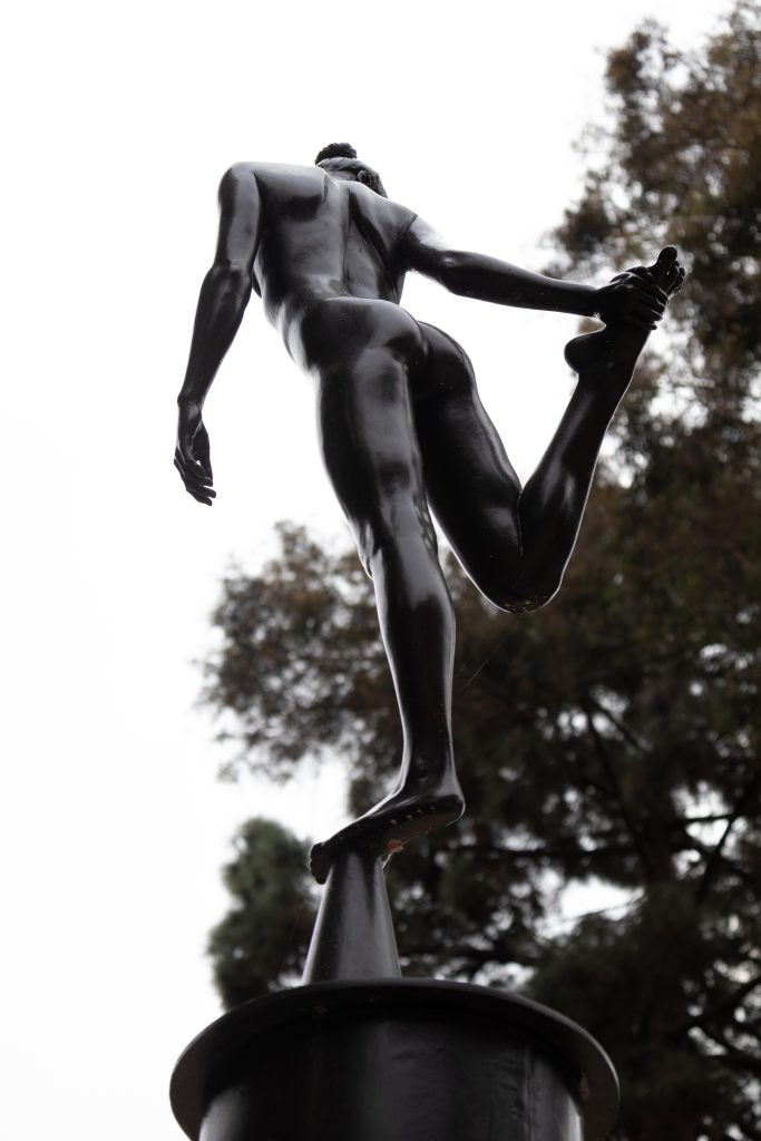 Dance Column II stands next to its sister in the Franklin D. Murphy Sculpture Garden. Sculpted by Robert Graham in 1978, it depicts the ghostly presence of dancing bodies along its length. Photographed by Julia Gu/BruinLife.