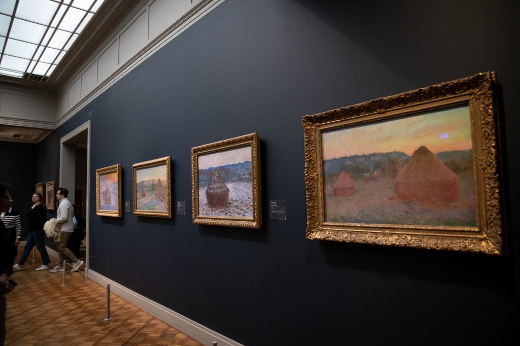 Claude Monet's series of haystacks through the seasons. Monet experimented with time's influence on the identity and character of spaces and objects. Photographed by Finn Martin/BruinLife.