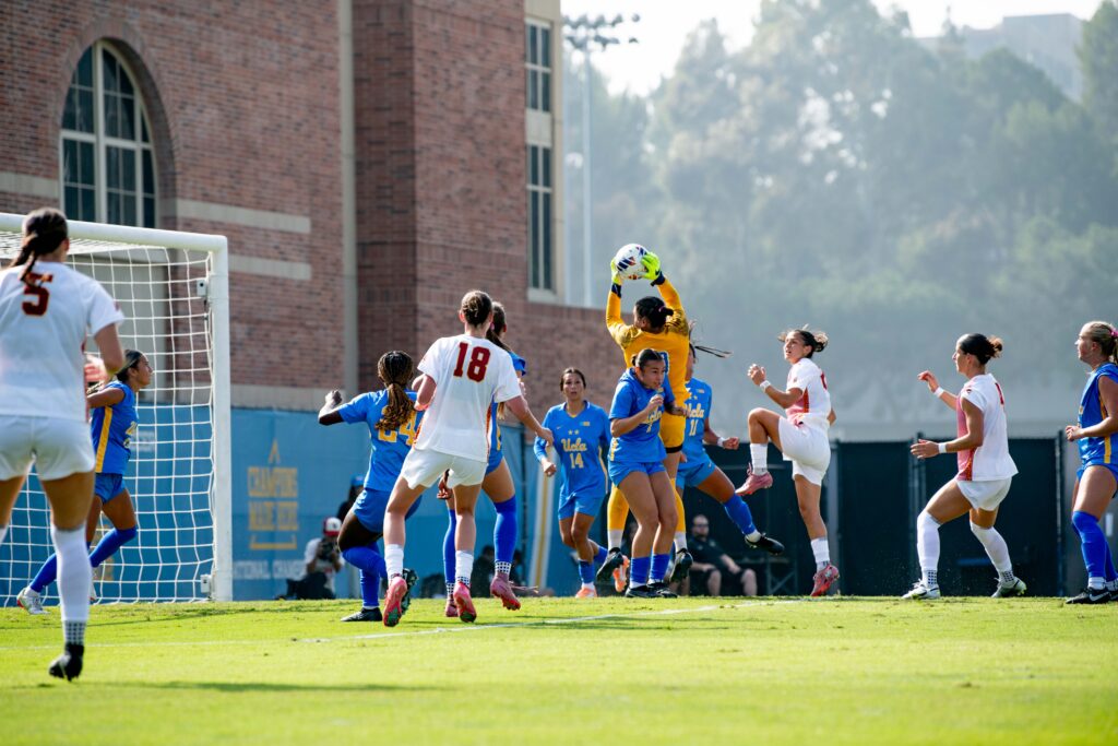 Freshman goalkeeper Daphne Nakfoor plucks a corner kick from the air in the first half of the game against USC. Photographed by Julia Gu/BruinLife.