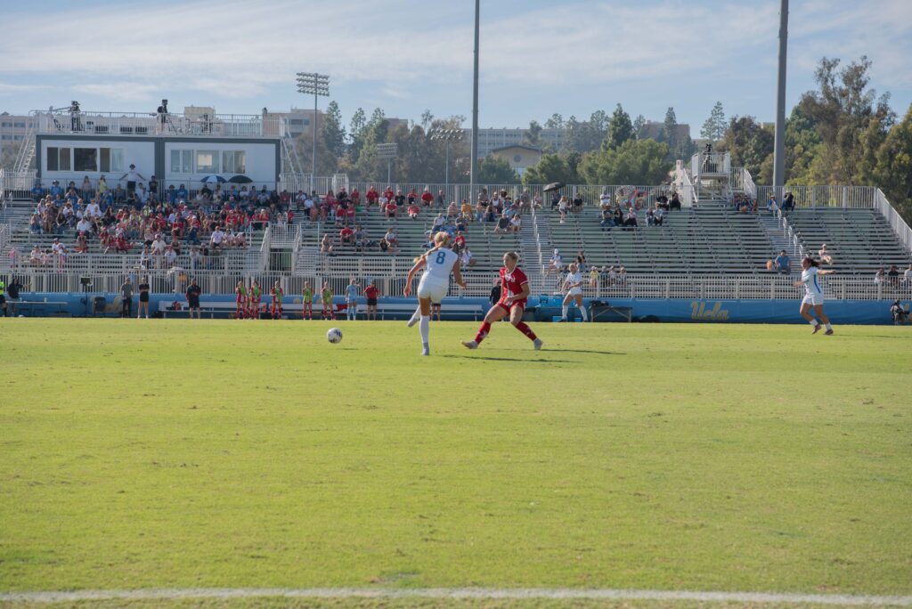 Defender Siena Meyer successfully keeps the ball away from Nebraska forward, Ava Makovicka. The Bruin defense and goalkeeper played a huge role in shutting out the Cornhuskers and securing the Bru-win. Photographed by Regan Rhodes/BruinLife.