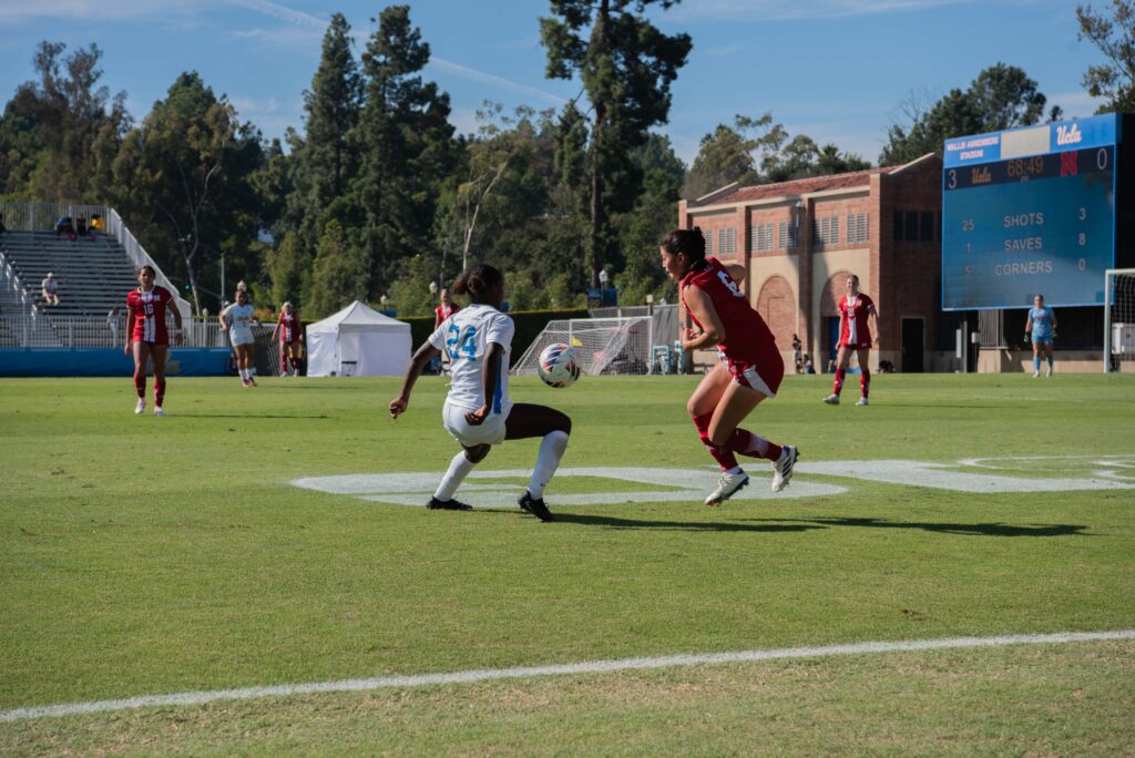 Forward Payten Cooper dribbles the ball up to Nebraska's goal, hoping to add a fourth goal to the Bruin's dominating win over the Cornhuskers. The freshman ended the game with a goal scored, helping the Bruins to a 6-2-2 season record going into their game against USC next weekend. Photographed by Regan Rhodes/BruinLife.