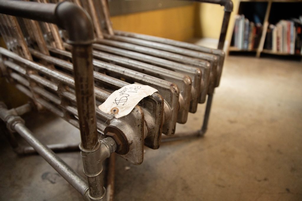 This chair matches another metal chair in the Horror Vault, and it has a slip of paper on it that jokingly demands a life in payment. Photographed by Julia Gu/BruinLife.