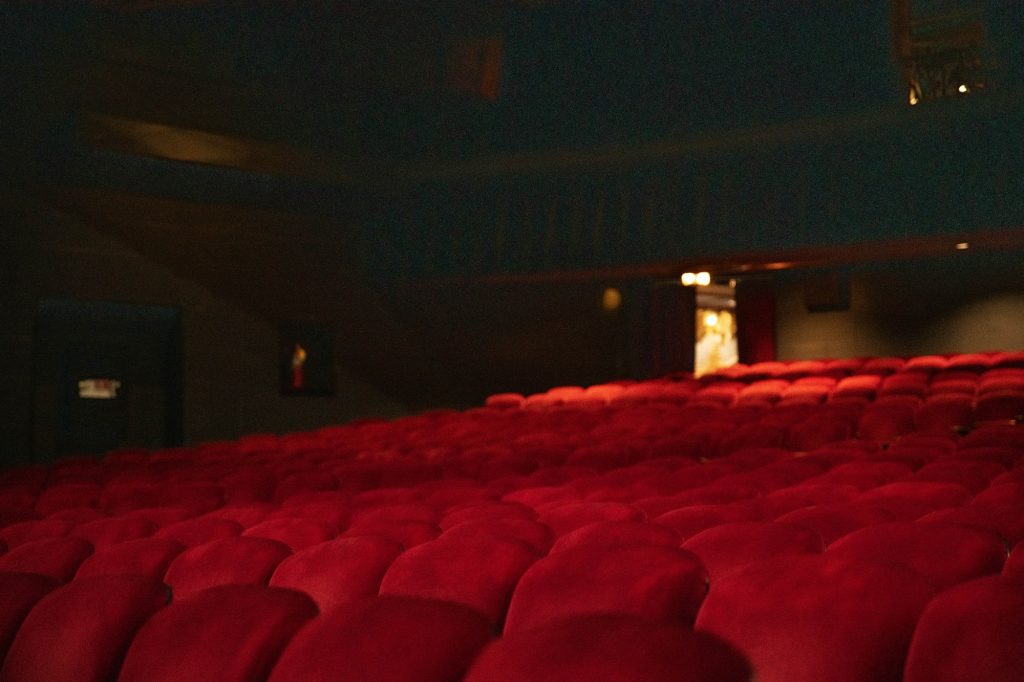 Inside the United Artists Theatre, red velvet seats await their guests. Photographed by Julia Gu/BruinLife.