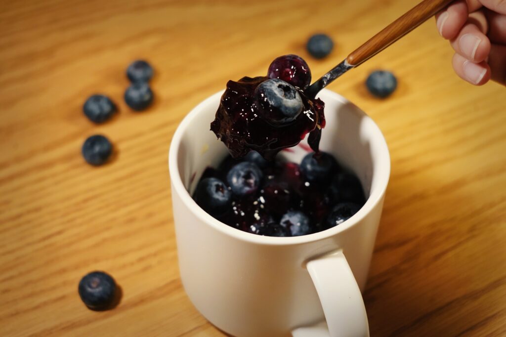 A smooth, creamy cheesecake layered with homemade blueberry jam. Photographed by Polly Lee/BruinLife.