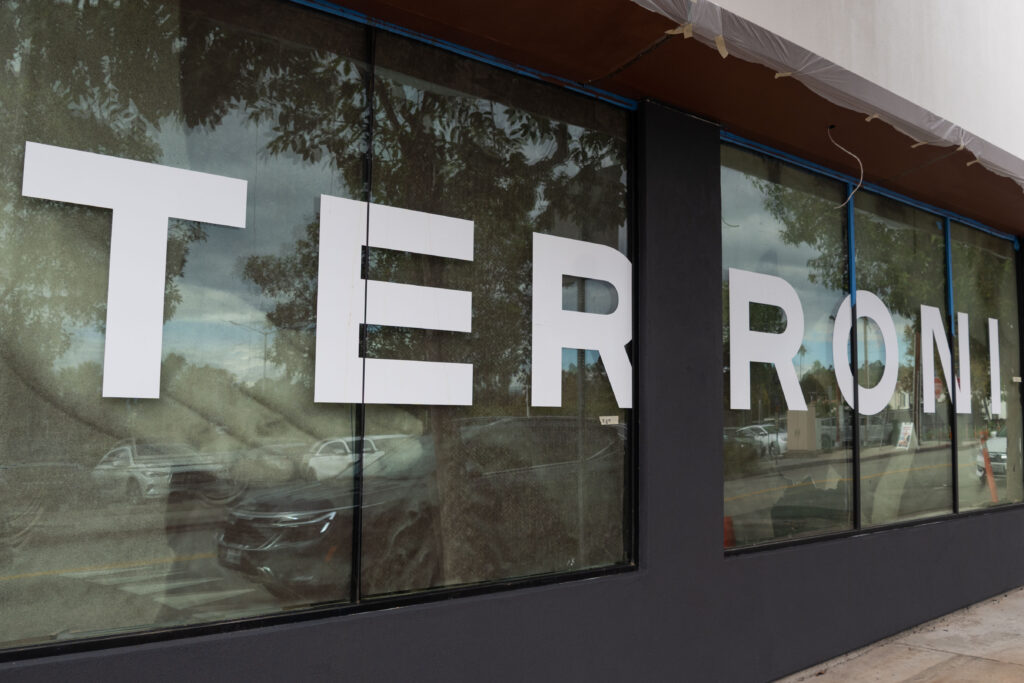 The upcoming Terroni location features a bold window graphic that stretches accross the storefront. Photographed by Aamani Maddukuri/BruinLife.