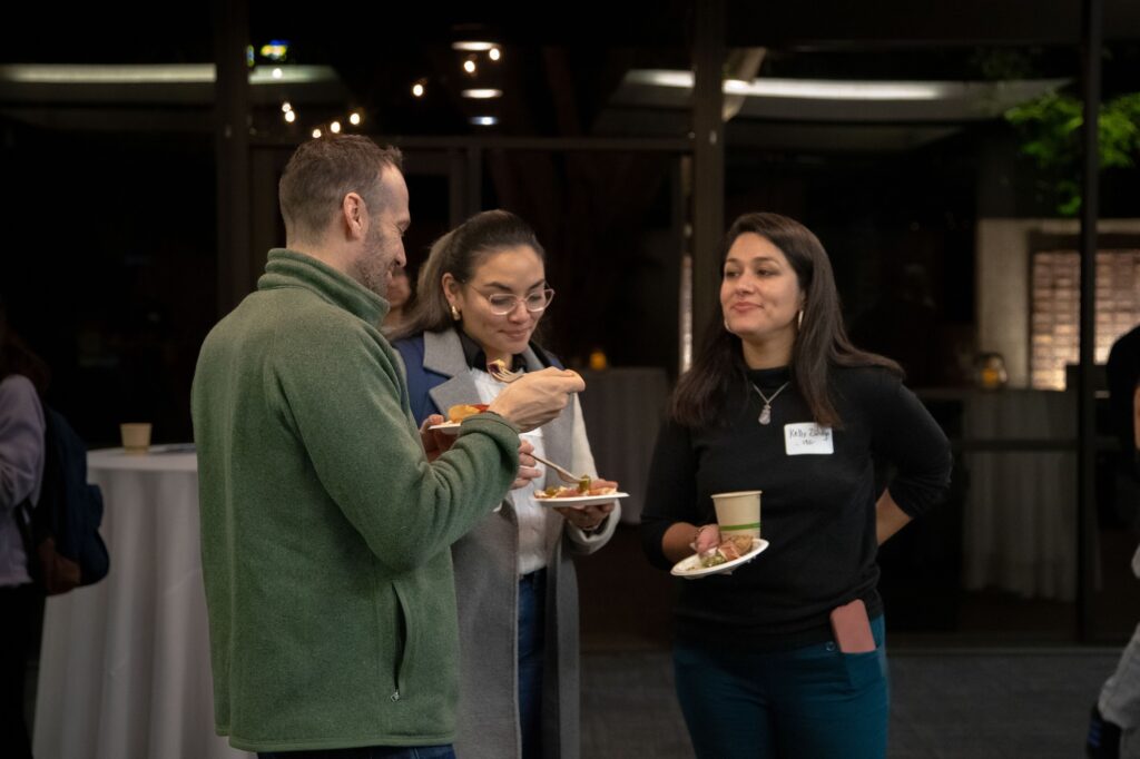 Attendees exchanged personal insights about their paths to philanthropy as they enjoyed the assorted Mediterranean delicacies. Photographed by Aaron Fu/BruinLife.