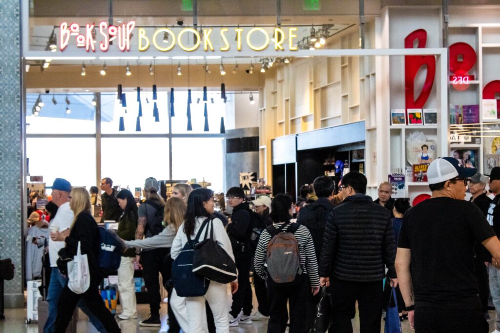 Unsure of when or if their flights will board, travelers do the unthinkable — buy a book. I picked up a copy of " The Subtle Art of Not Giving a F*ck" by Mark Manson, hoping it would teach me how to not give a darn about my current situation. Photographed by Gavin Meichelbock/BruinLife.