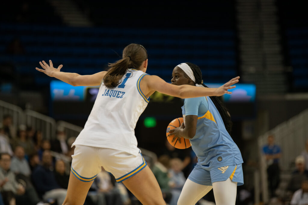 #11 Gabriela Jaquez defends against a Southern University guard. Jaquez contributed six points, five assists and two steals to the Bruin domination of the Jaguars. Photographed by Regan Rhodes/BruinLife.