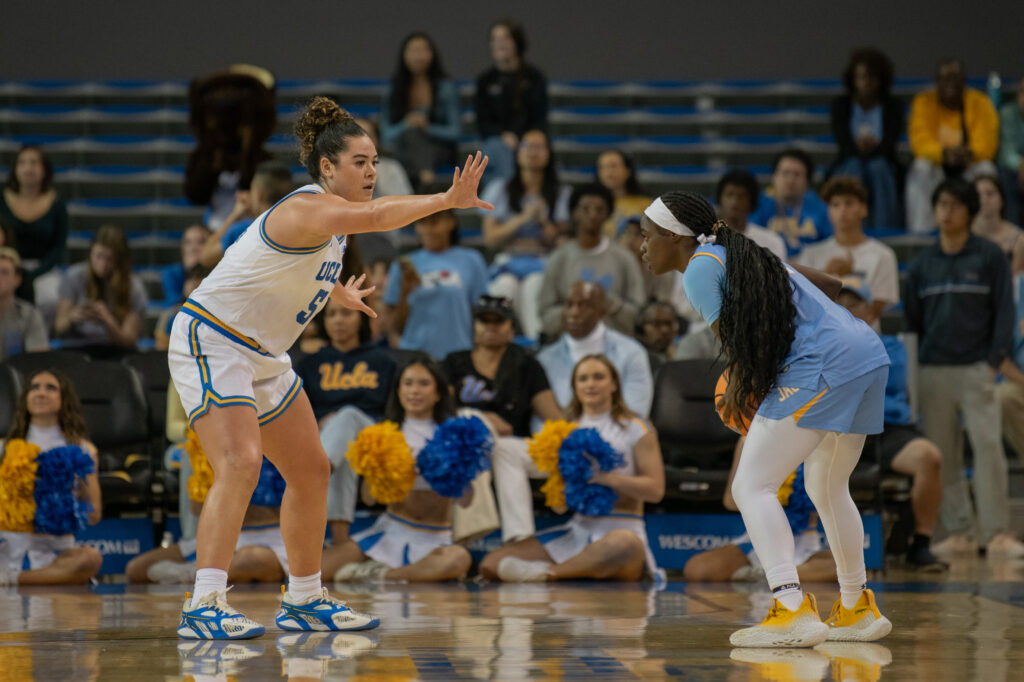 #5 Charlisse Leger-Walker guards a Southern University player looking to score. Leger-Walker lead the Bruins with a team high of seven assists in their overwhelming victory over the Jaguars. Photographed by Regan Rhodes/BruinLife.