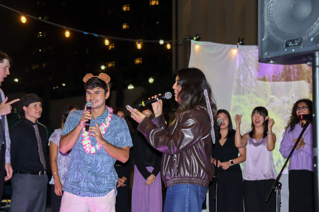 Two members of the On Campus Housing Council welcome students to Sustainival. Sustainival has been hosted by OCHC for years, promoting sustainability at UCLA. Photographed by Regan Rhodes/BruinLife.