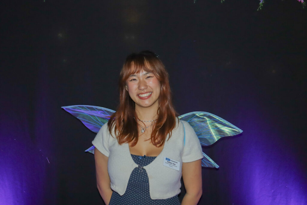 OCHC Executive member Ashlyn Sze poses in the photo booth set up at Sustainival. The event had many sustainable crafts and activities for participants to engage in. Photographed by Regan Rhodes/BruinLife.