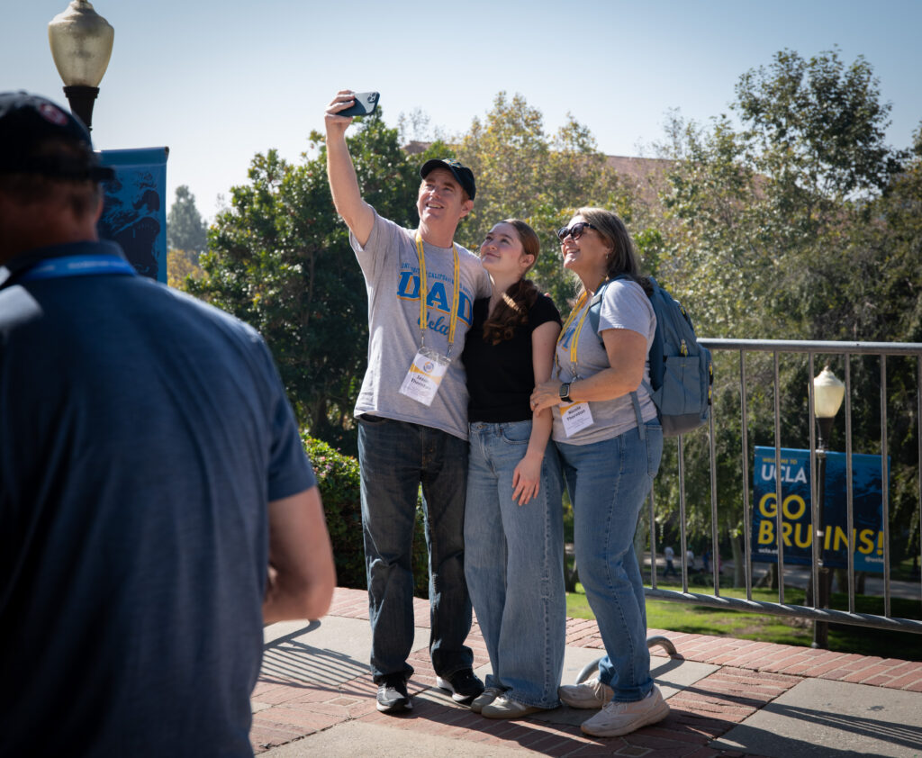 The Thornton Family takes a selfie at the precipice of the Janss steps on closing day of Bruin Family Weekend. Photographed by David Zakaryan/BruinLife.