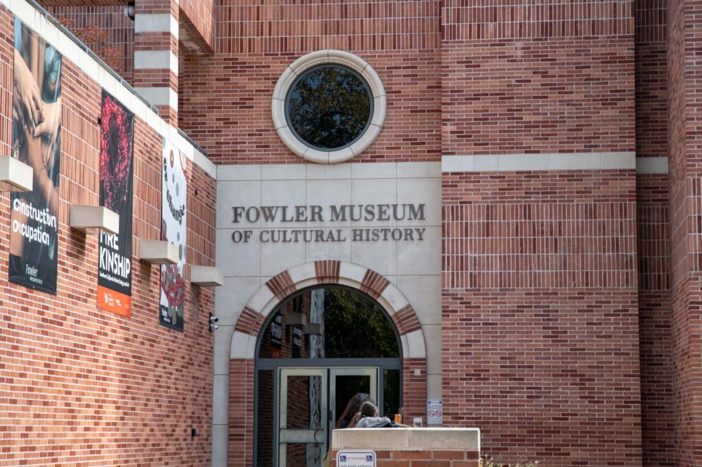 Two students stand outside of UCLA&squot;s Fowler Museum. The museum was the location of a recent Los Angeles Times Food Bowl screening and discussion of "Field Trip: Hong Kong." Photographed by Regan Rhodes/BruinLife.