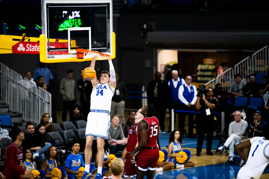 All eyes are on Tyler Bilodeau as he secures another point for the Bruins in the second half of the match against Eastern Washington. Bilodeau started off the 2025–26 season strong, with eight 2-pointers, three 3-pointers, six rebounds and two steals under his belt. Photographed by Jaclyn Wang/BruinLife.