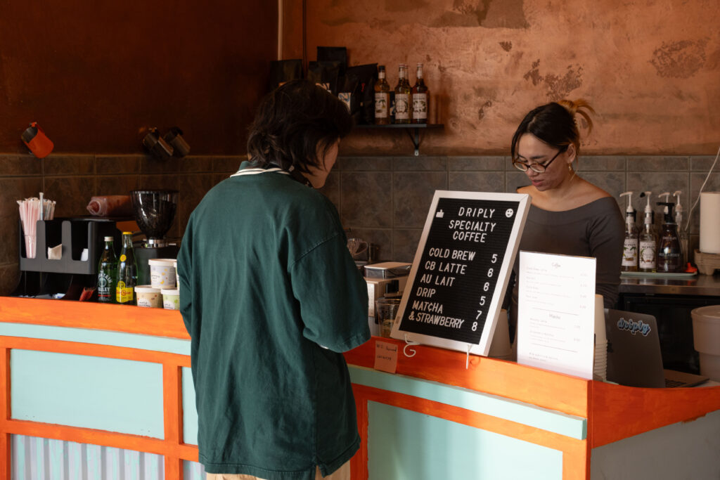 A customer orders at Driply Coffee. Photographed by Aamani Maddukuri/BruinLife.