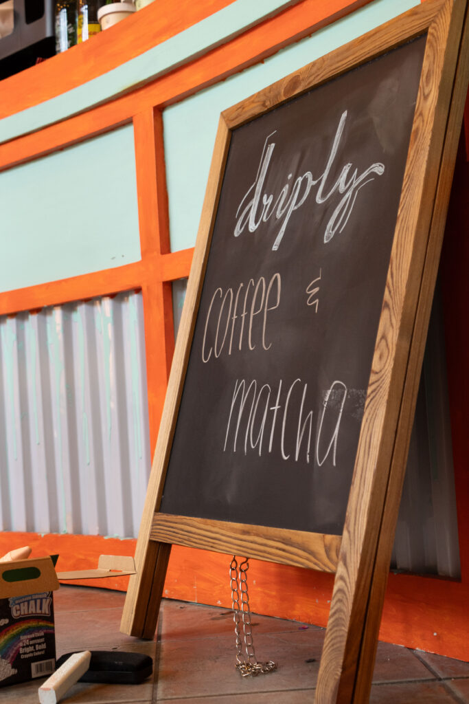 A colourful chalkboard advertising Driply's signature drinks. Photographed by Aamani Maddukuri/BruinLife.