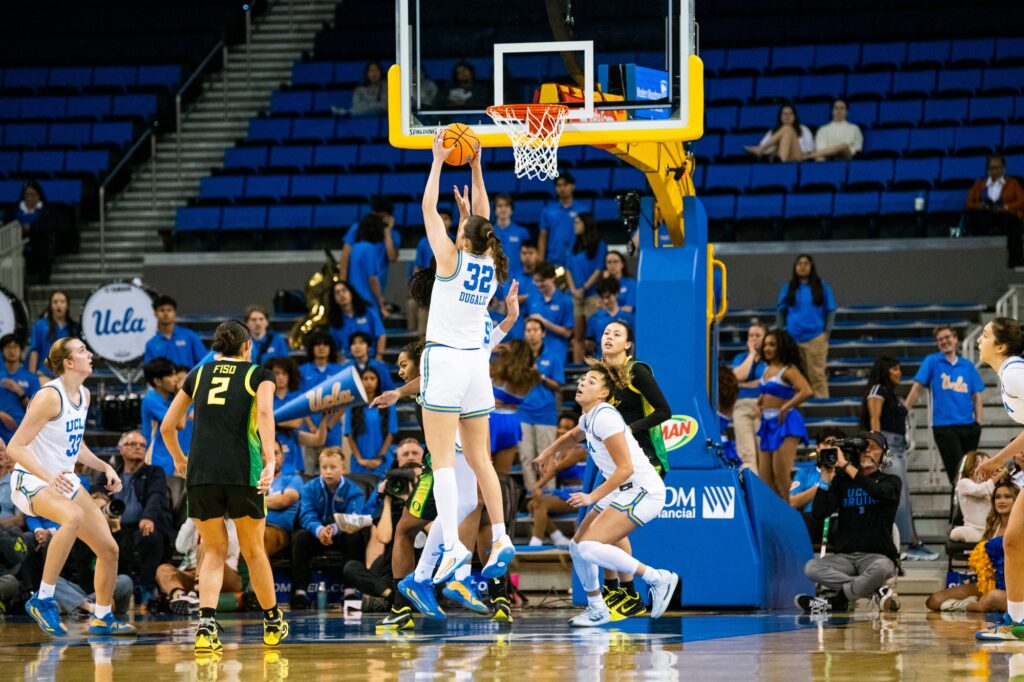 Forward Angela Dugalić plunges into the air when trying to get the ball during a _____.