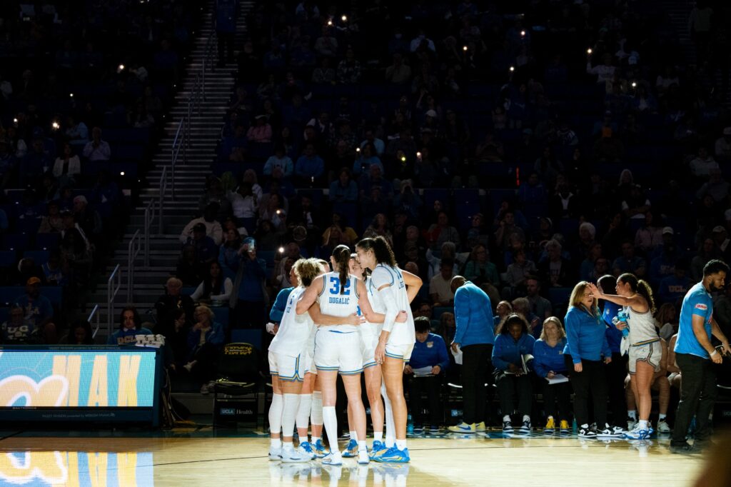 The players huddle up to strategize their next moves.