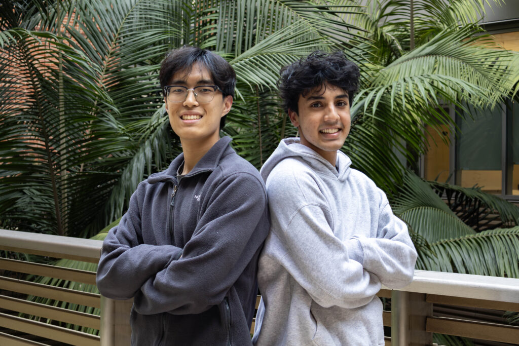 Second year electrical engineering student Gary Li (left) and second year computer science student Ishan Royyuru (right) recently joined forces with DevX at UCLA to bring their mobile app Sync to life. Though young, the startup is promising, with a wide prospective user base of college students like Li and Royyuru who balance busy schedules and meaningful social lives with friends. Photographed by Julia Gu/BruinLife.